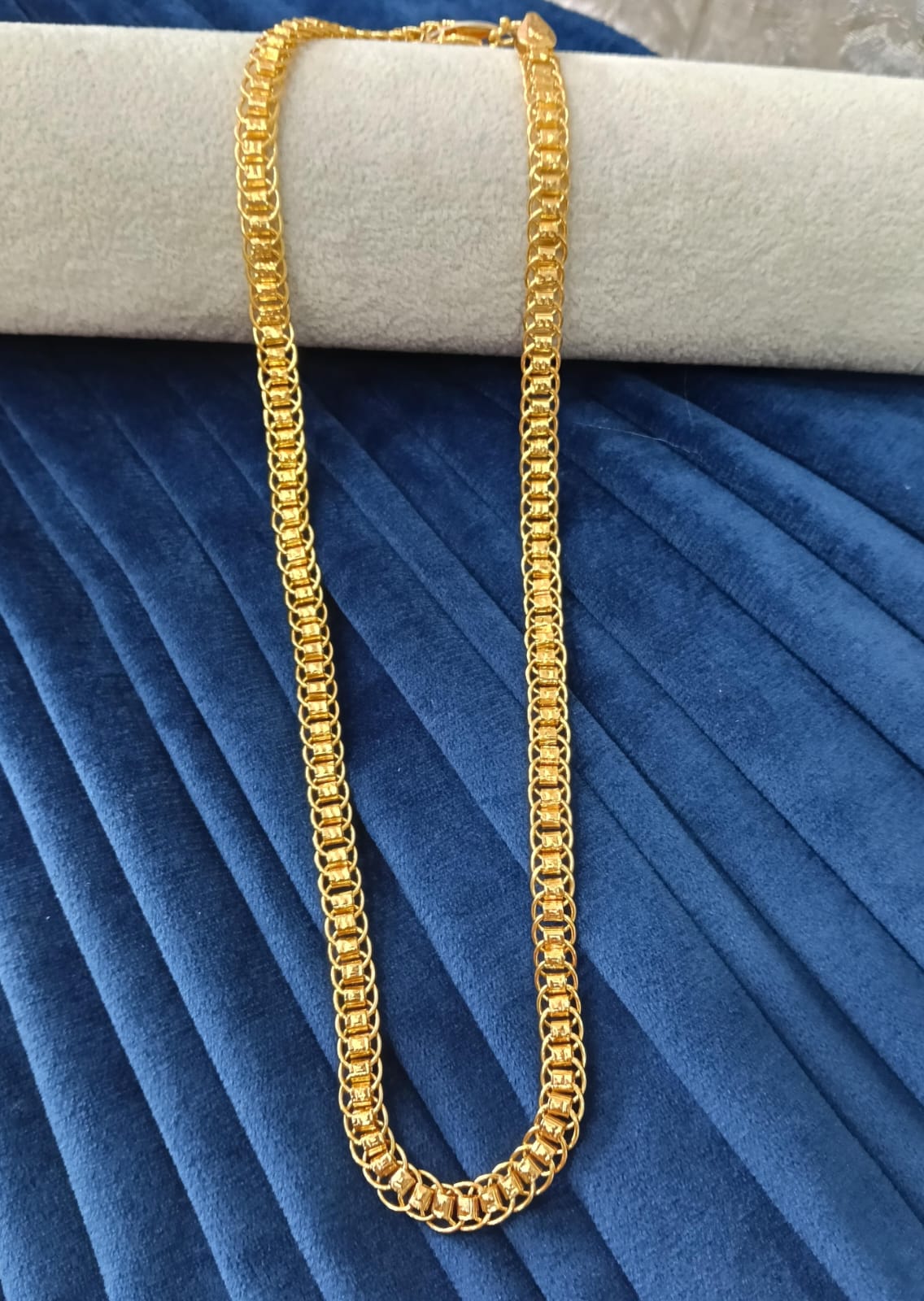 Gold plated chain.