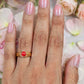Impon coral ring.