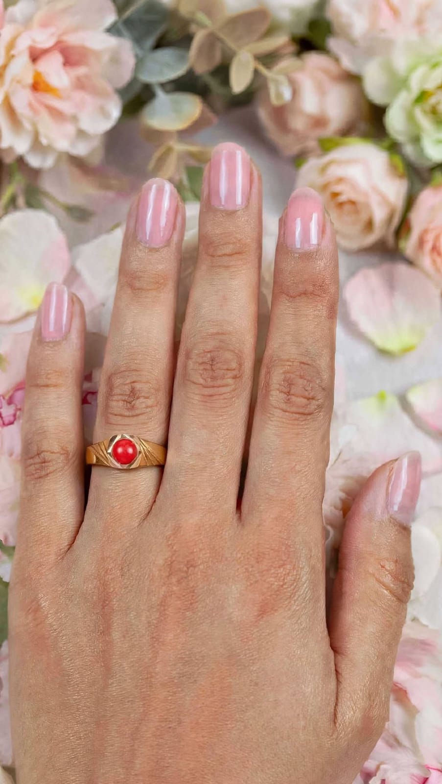 Impon coral ring.