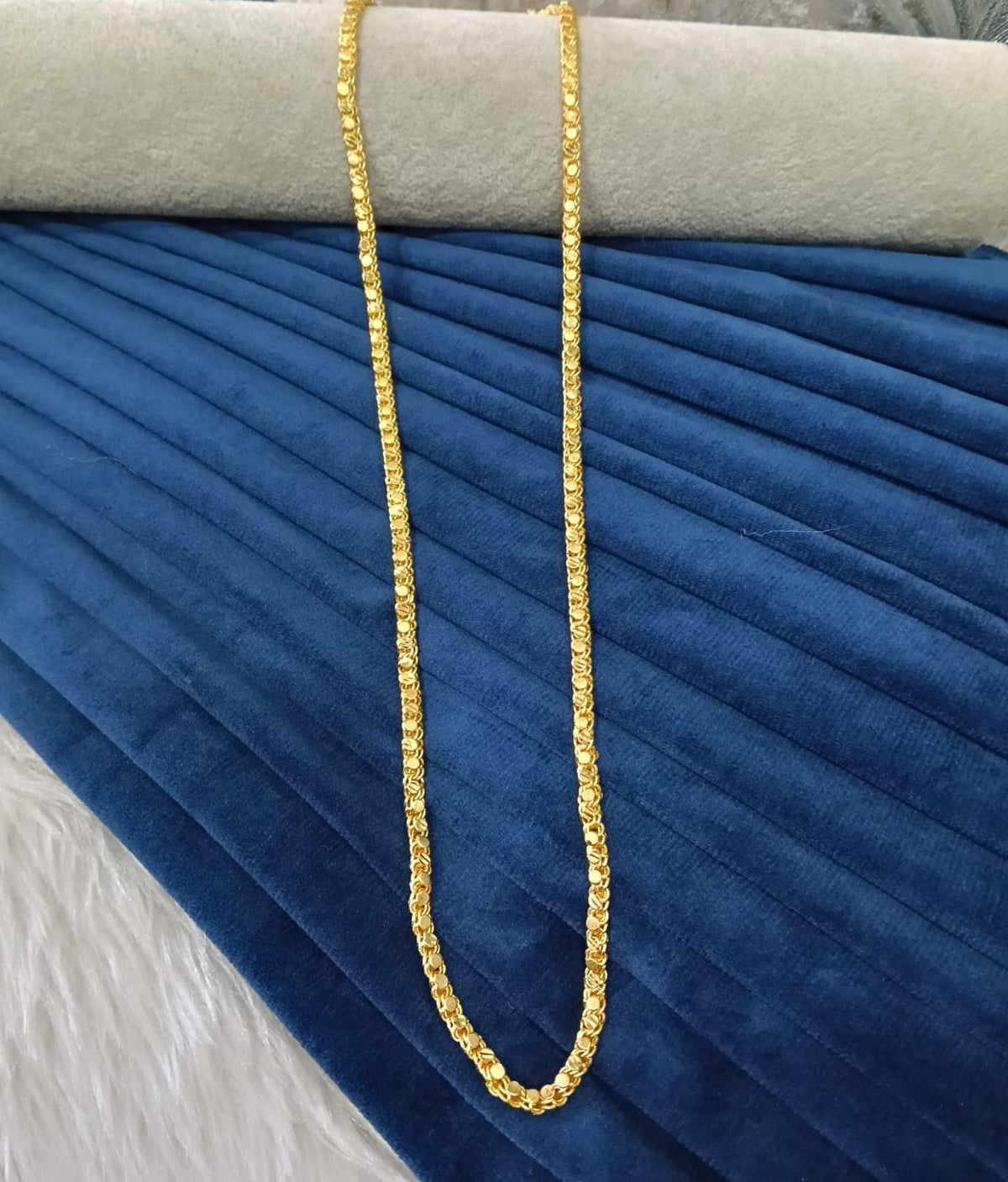 Gold plated chain.