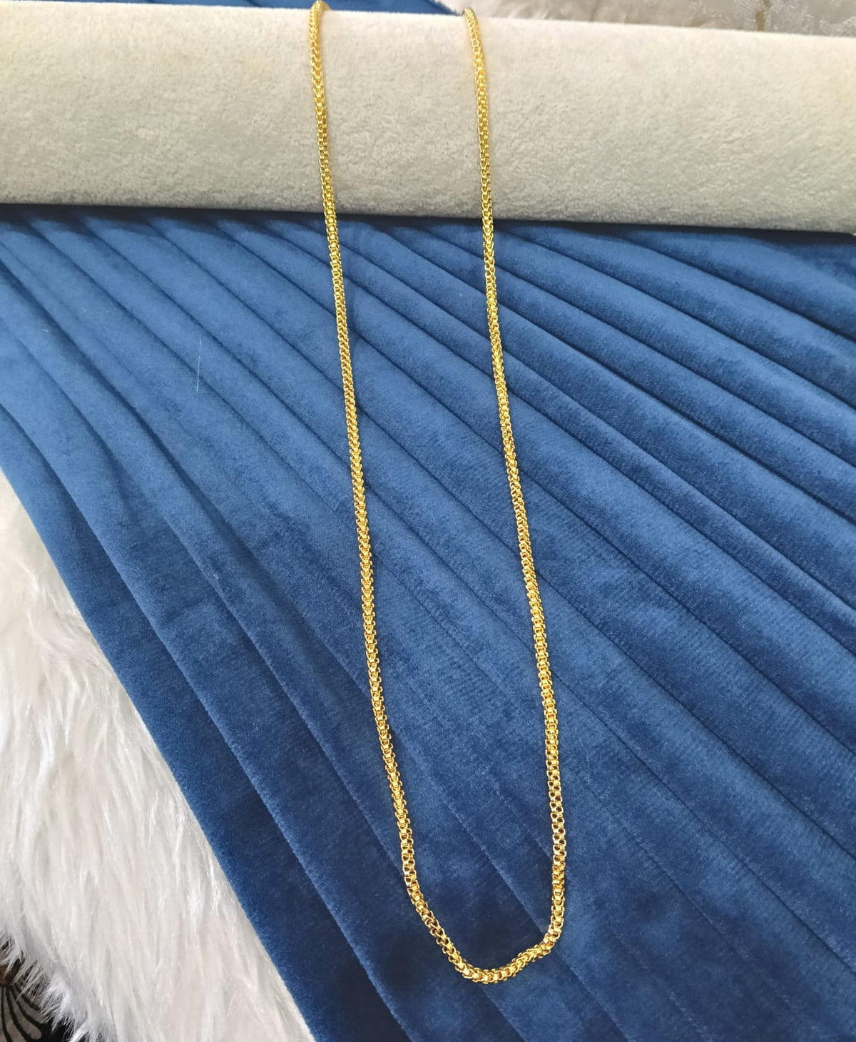 Gold plated chain.