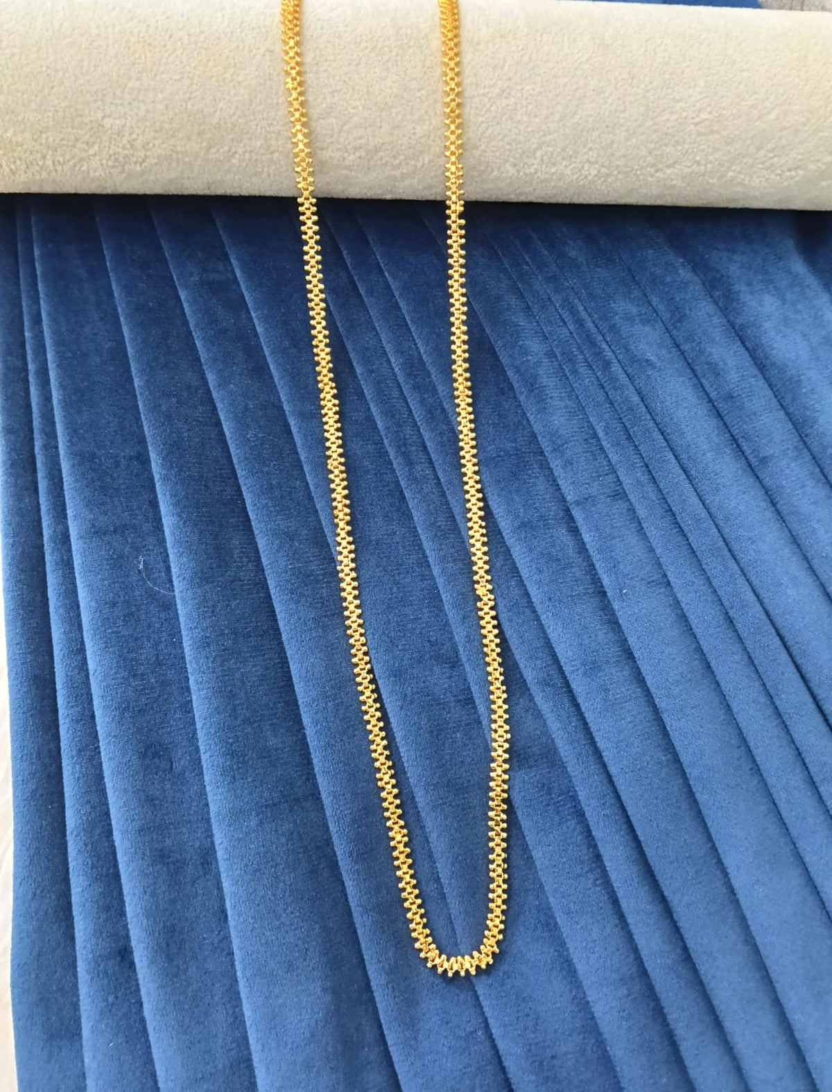 Gold plated chain.