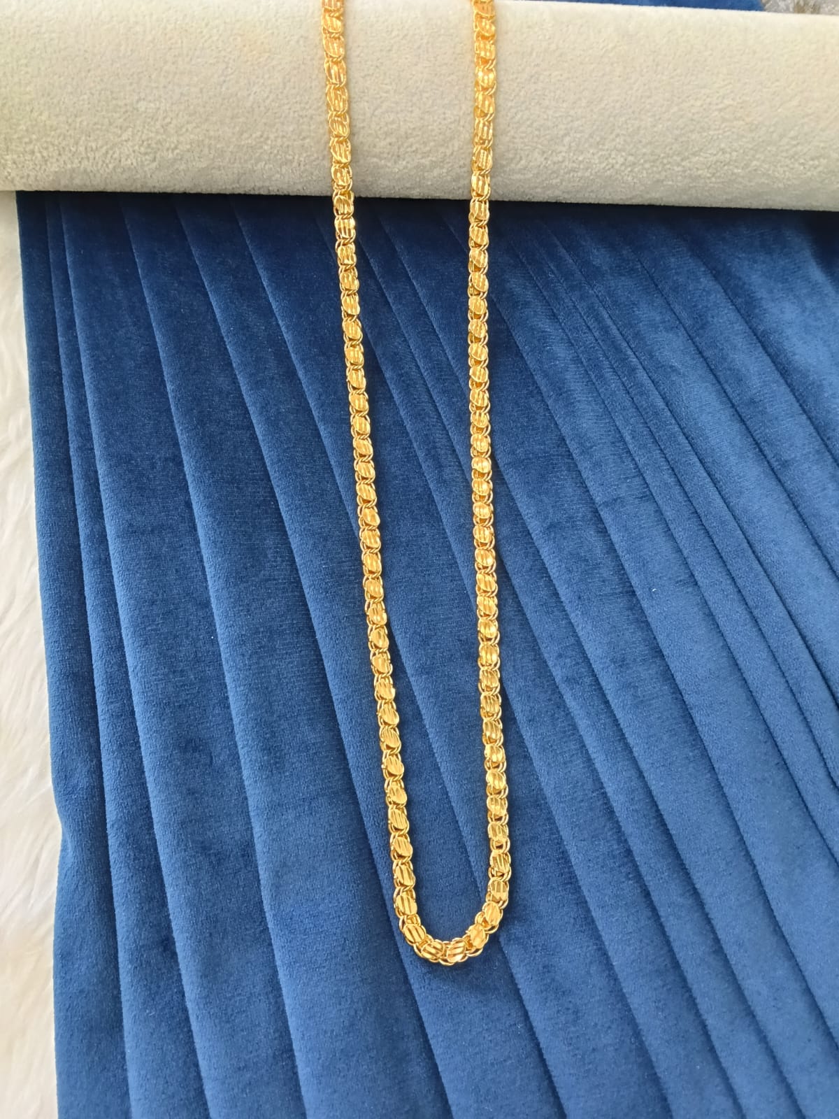 Gold plated chain.