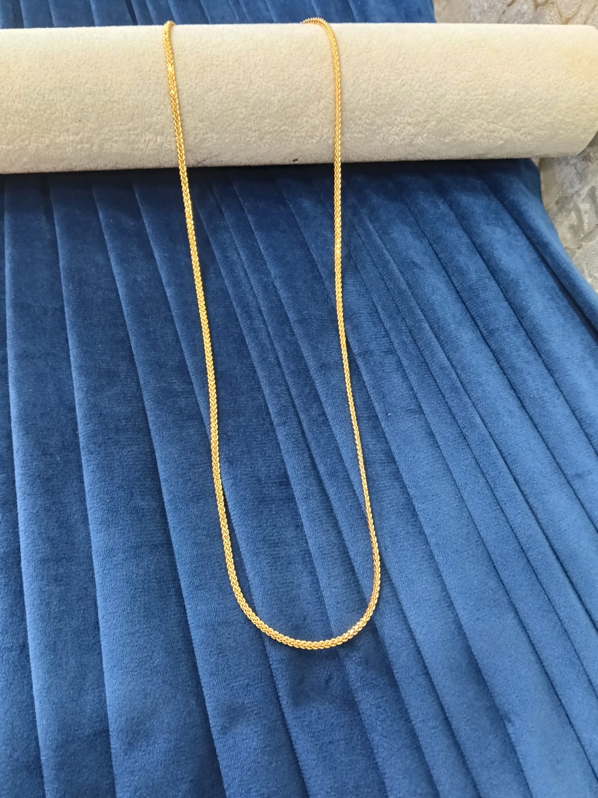 Gold plated chain.