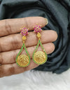 Gold plated earing.