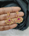 Gold plated earing.