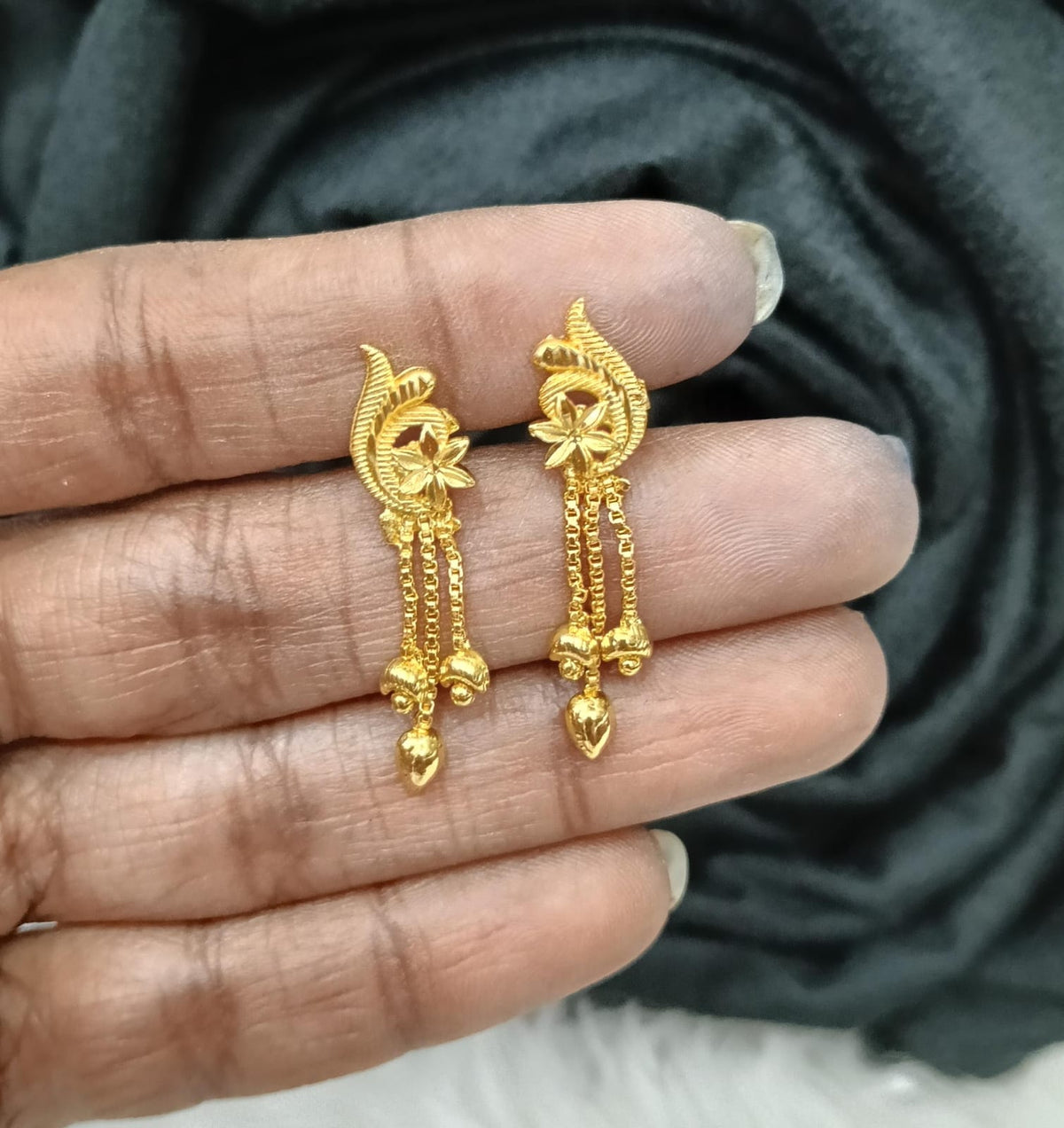 Gold plated earing.