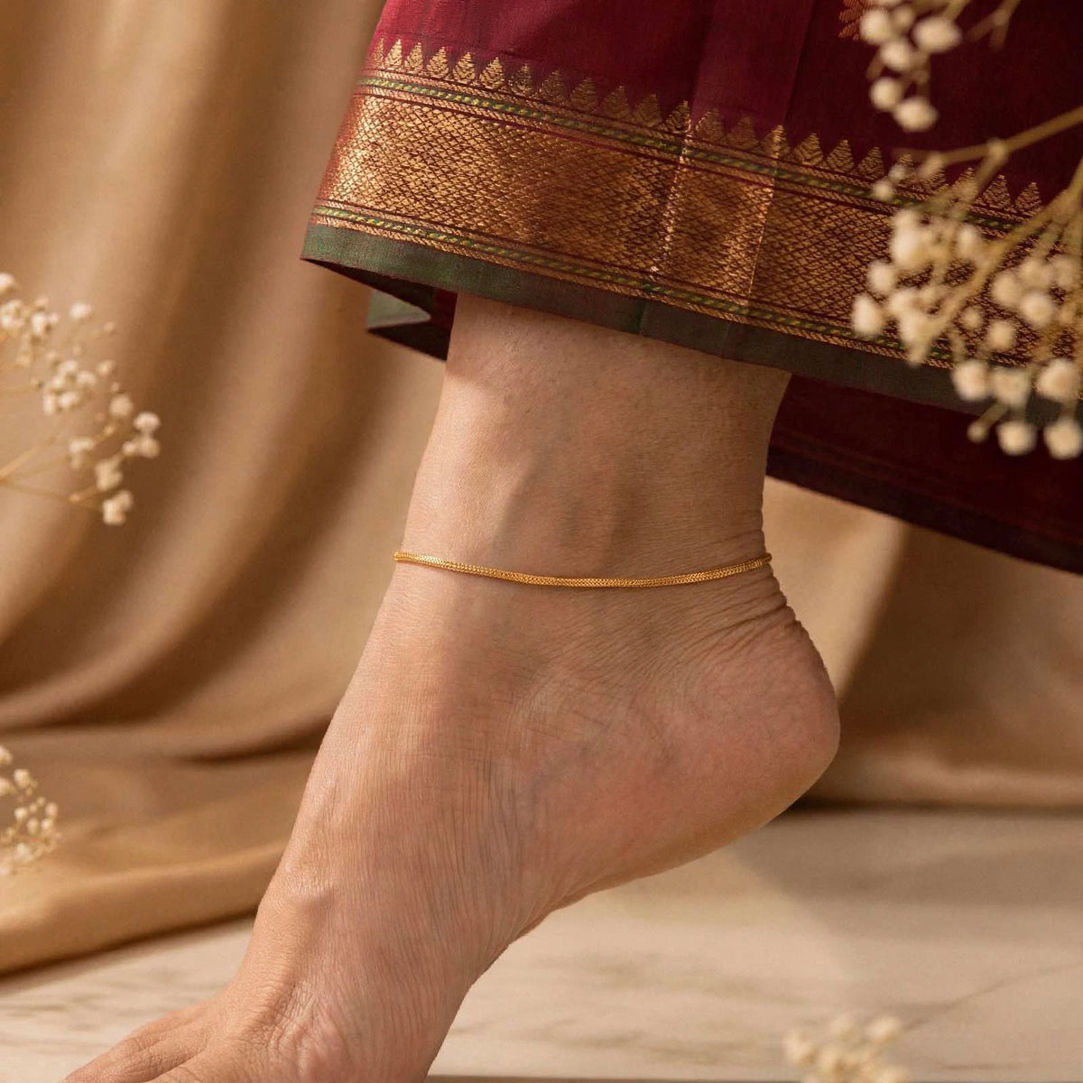 Gold plated anklet.