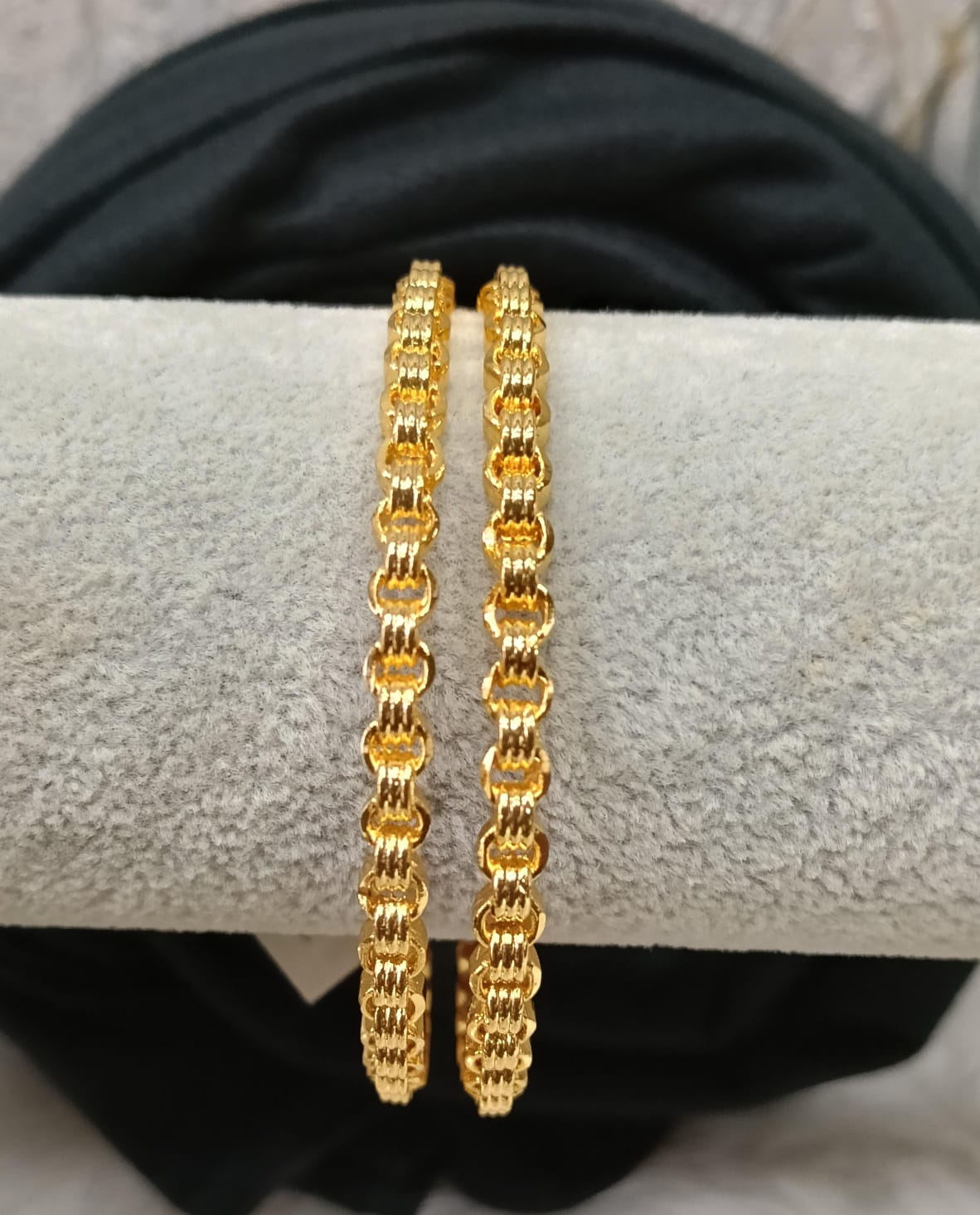 Gold plated bangle.