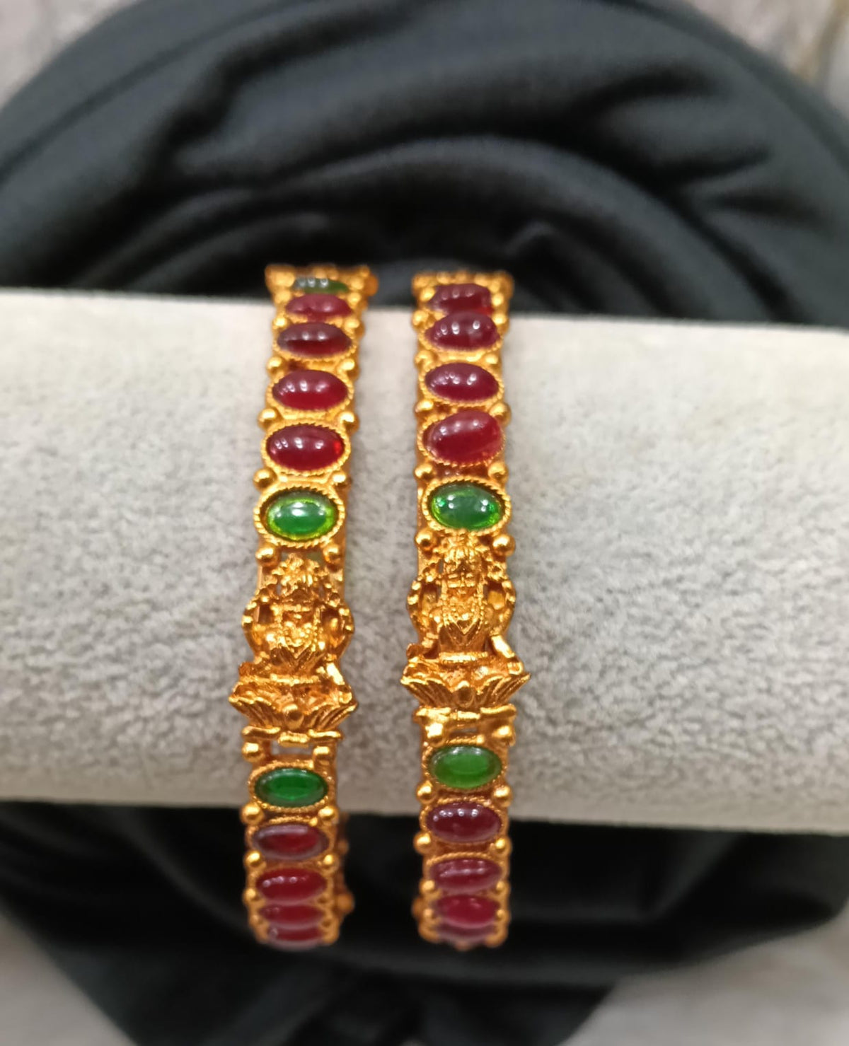 Gold plated bangle.