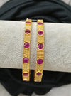 Gold plated bangle.