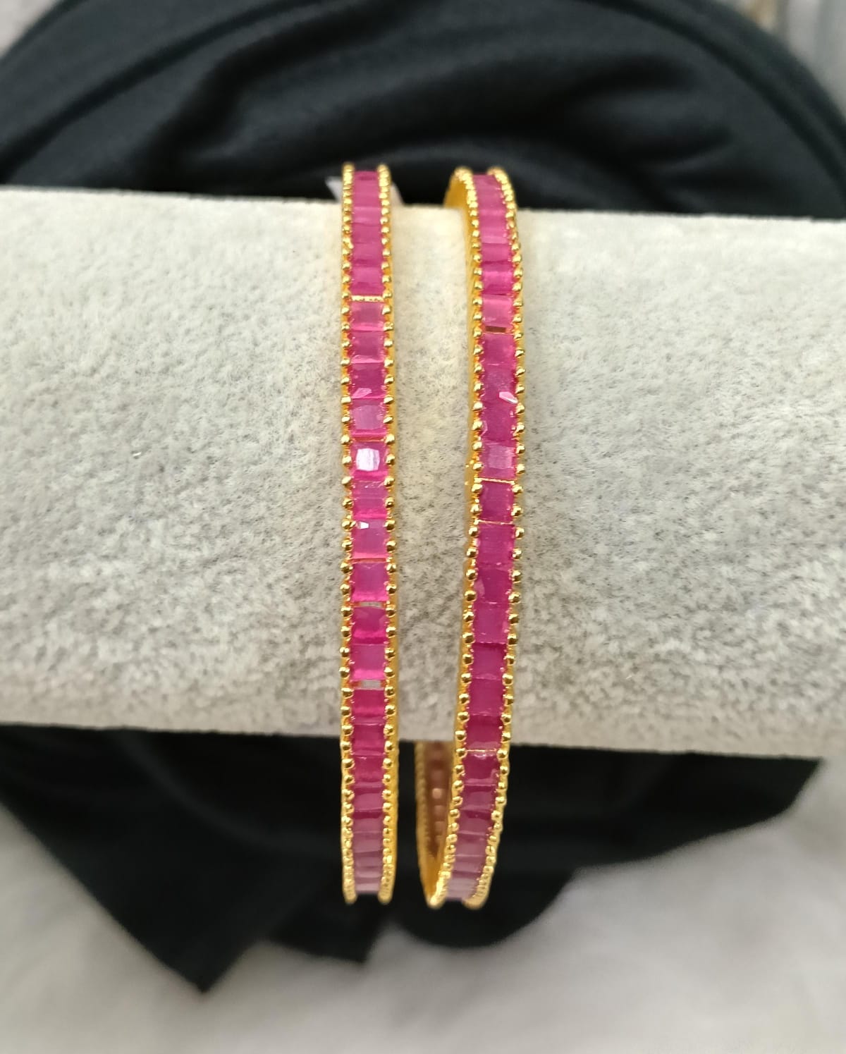 Gold plated AD bangle.