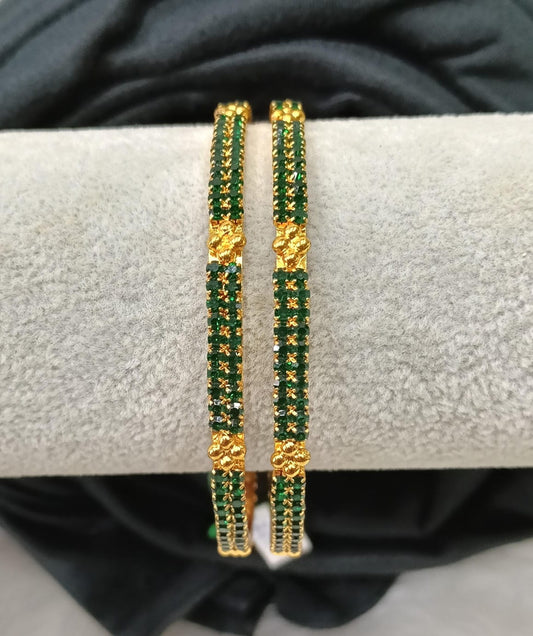 Gold plated AD bangle.