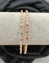 Gold plated AD bangle.