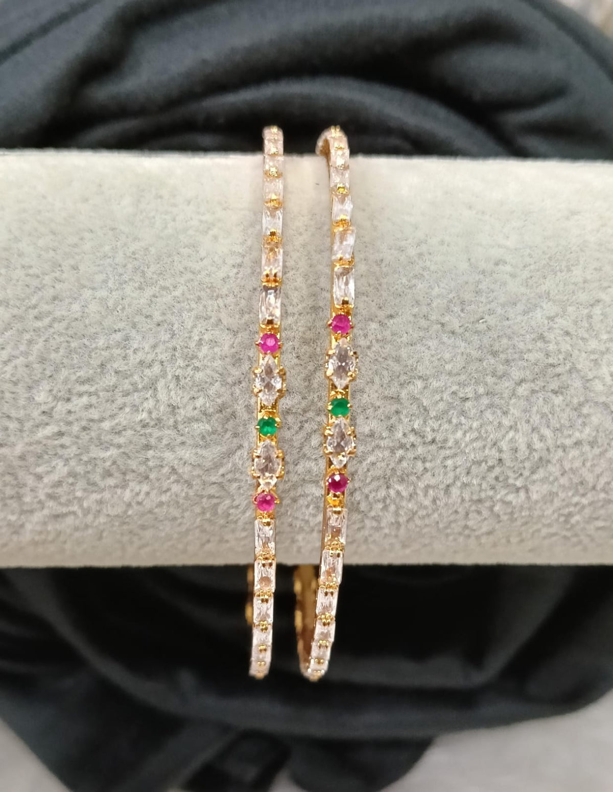 Gold plated AD bangle.