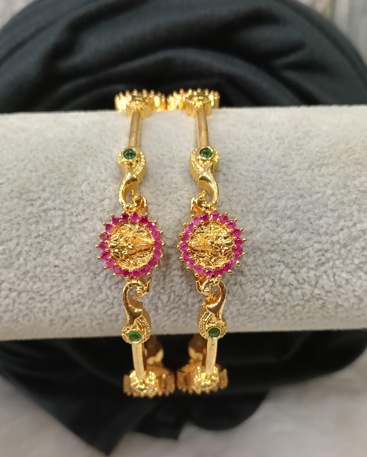 Gold plated bangle.