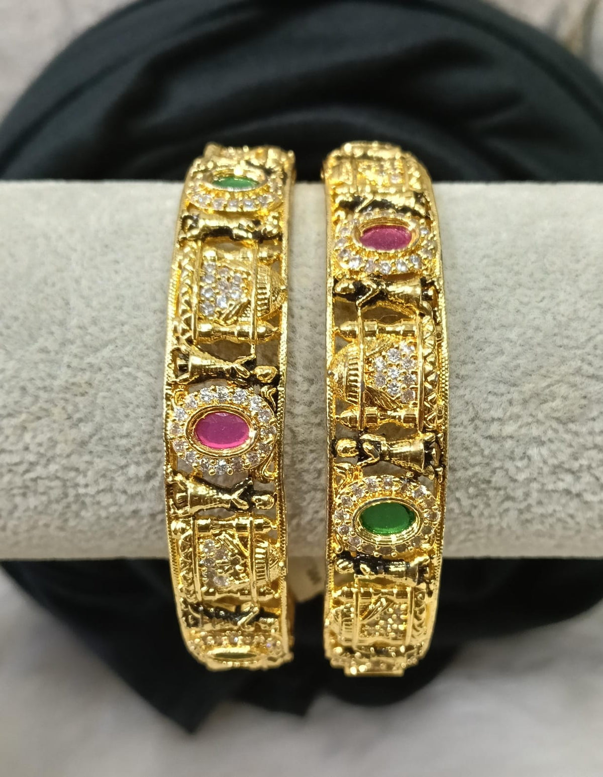 Gold plated bangle.