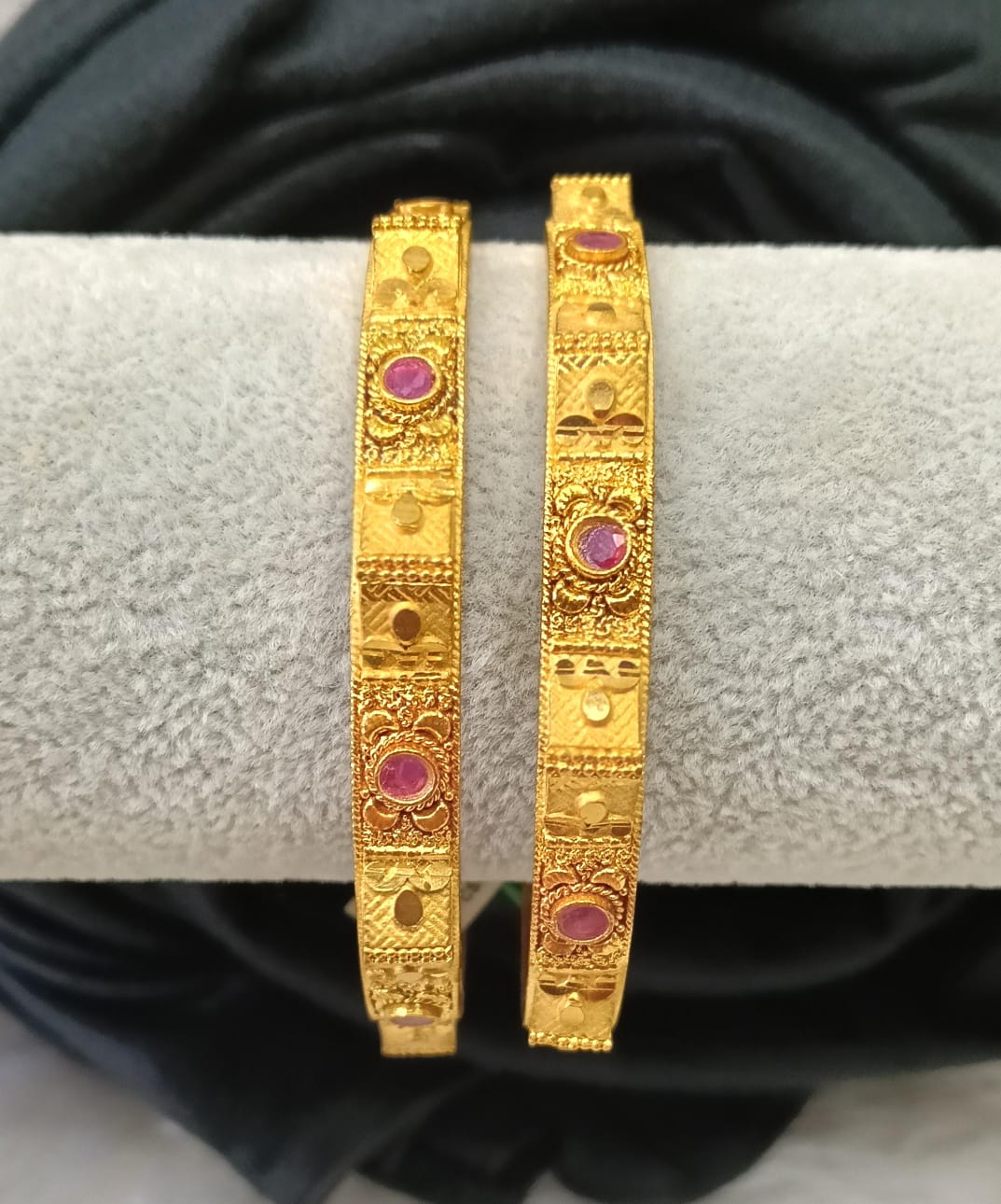 Gold plated bangle.