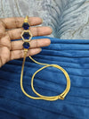 Gold look mugappu chain.