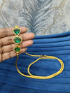 Gold look mugappu chain.