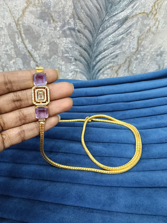 Gold look mugappu chain.