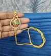 Gold look mugappu chain.