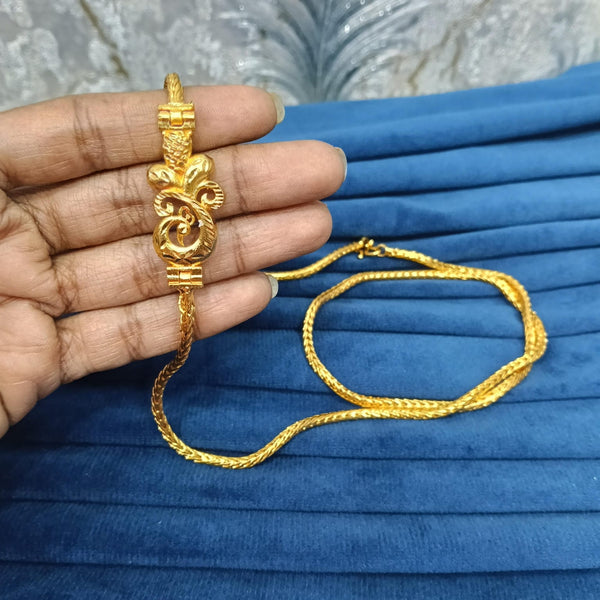 Gold look mugappu chain.