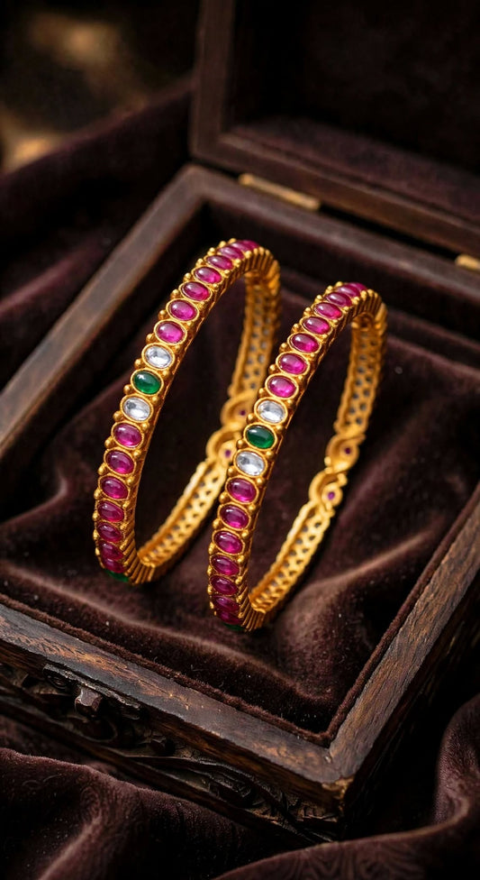 Gold Plated Kemp Bangle.