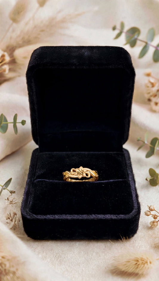 Gold plated adjustable ring.