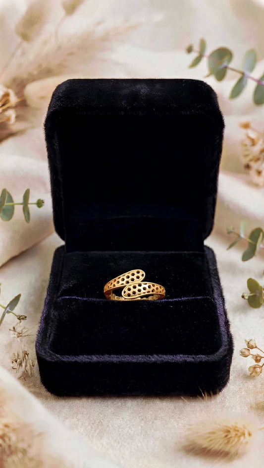 Gold plated adjustable ring.