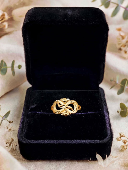 Gold plated adjustable ring.
