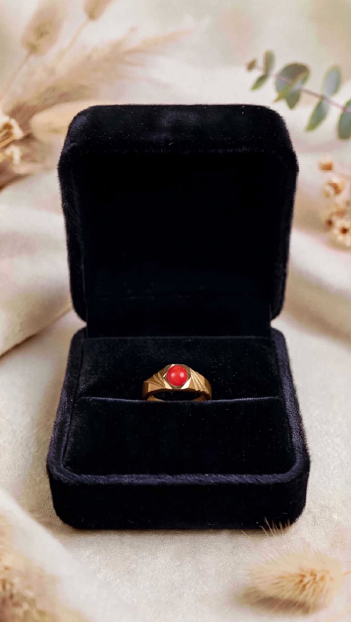 Impon coral ring.